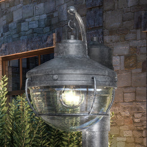 A beautiful outdoor lighting fixture: UEX1059 Nautical Outdoor Post Light 12''H x 9''W, Aged Zinc Finish, Telluride Collection with a glass globe, by