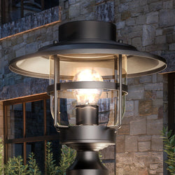 A beautiful Farmhouse Outdoor Post Light 12''H x 11''W, Oil Rubbed Bronze Finish, Belvidere Collection by Urban Ambiance with a light on it.