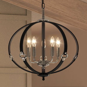 A unique UEX2002 Lux Industrial Chandelier hanging over a dining room table.
