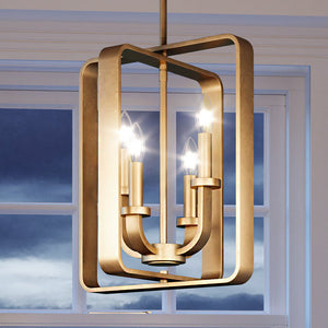 A unique UEX2014 New Traditional Chandelier in a Native Brass Finish from the Montpelier Collection hanging over a window by Urban Ambiance.