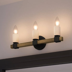 A beautiful Urban Ambiance bathroom light fixture with three UEX2057 Modern Farmhouse Bath Light 6''H x 21''W, Matte Black Finish, Greenville Collection candles on it.