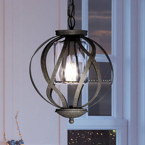 A gorgeous Tuscan chandelier from the Urban Ambiance Hamilton Collection hanging from a living room window.