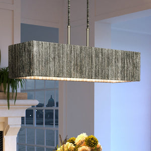 A unique lighting fixture, the Urban Ambiance Bohemian Chandelier 9''H x 40''W, with a Polished Nickel Finish from the Rutherford Collection hangs over a dining room