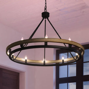 A UEX2103 Rustic Chandelier 24''H x 34''W, Matte Black Finish, Burlington Collection by Urban Ambiance illuminating a room.