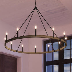 A beautiful UEX2116 New Traditional Chandelier, with a gorgeous Oil Rubbed Bronze Finish, hanging over a window in a living room.