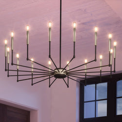 A unique lighting fixture, the UEX2202 Lux Industrial Chandelier from the Bloomington Collection by Urban Ambiance, hanging in a living room.