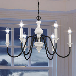 A UEX2240 New Traditional Chandelier 17''H x 28''W, Soft White & Black Finish, Springfield Collection chandelier in front of a window that is luxurious and beautiful.