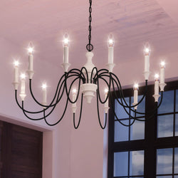 A gorgeous UEX2243 New Traditional Chandelier, with a luxury soft white & black finish, from the Springfield Collection by Urban Ambiance hanging in a room.