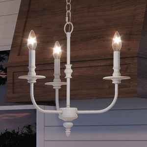 A unique UEX2263 Cottagecore Chandelier with a beautiful Weathered White Finish from the Everett Collection by Urban Ambiance hanging over a stove.
