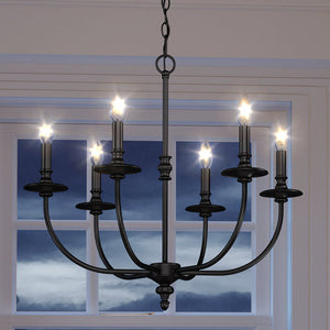 A gorgeous Cottagecore Chandelier by Urban Ambiance hanging in front of a window.