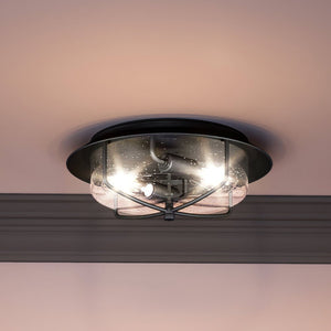 A luxury lighting fixture, the UEX2280 Nautical Ceiling Light features a matte black finish and round glass shade.