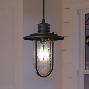 A unique lighting fixture, the gorgeous Urban Ambiance Nautical Pendant 11''H x 8''W with a Matte Black Finish from the Boston Collection, hangs over a window.