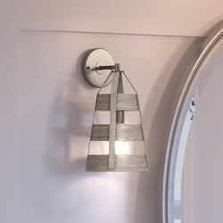 An Urban Ambiance UEX2292 Modern Farmhouse Wall Sconce is a gorgeous lighting fixture mounted on a wall next to a mirror.