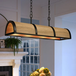 A gorgeous pendant lamp hanging over a fireplace in a beautiful kitchen.