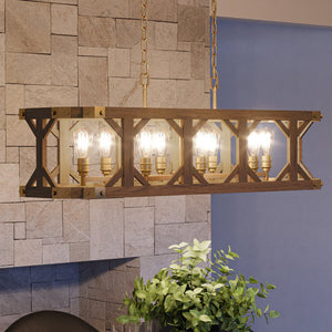 A unique lamp, the Urban Ambiance UEX2317 Old World Chandelier 12''H x 48''W in a Satin Brass Finish from the Frankfort Collection hangs over a fireplace
