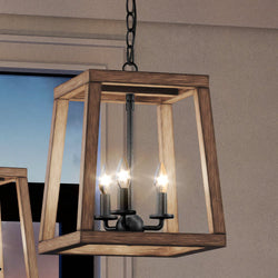 Three unique UEX2340 Industrial Lux Pendant 14''H x 12''W, Matte Black Finish, Pittsburg Collection lights hanging from a wooden frame in a room, Urban Ambiance.