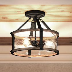 A unique lighting fixture, the UEX2354 Industrial Lux Ceiling Light 12''H x 15''W from the Elwood Collection by Urban Ambiance features a round glass shade and Charcoal