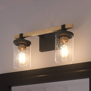 Two beautiful Urban Ambiance UEX2358 New Traditional Bath Light fixtures hanging above a bathroom mirror.