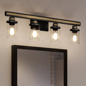 A gorgeous 9''H x 30''W UEX2377 New Traditional Bath Light with three lights and a mirror by Urban Ambiance.