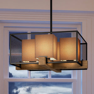 A unique minimalist chandelier, the Urban Ambiance UEX2390 features a oil rubbed bronze finish and hangs over a window in a living room.
