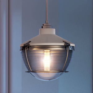 An Urban Ambiance UEX2402 Lux Industrial Pendant, a gorgeous lighting fixture, hanging from a ceiling in a room.