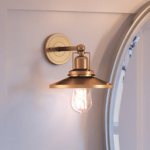 A luxury lighting fixture, the Urban Ambiance UEX2434 New Traditional Wall Sconce 7''H x 8''W, Satin Brass Finish from the Sanford Collection is