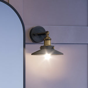 An Urban Ambiance UEX2440 New Traditional Wall Sconce 8''H x 8''W, Antique Brass & Graphite Finish from the Sanford Collection with a beautiful mirror