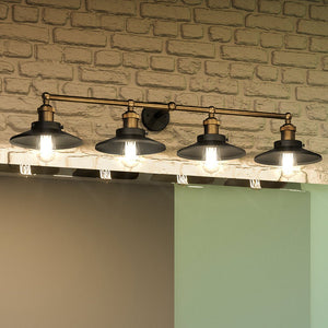 Three beautiful lighting fixtures on a brick wall in a luxury bathroom.