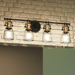 A beautiful lighting fixture for urban ambiance, the unique UEX2460 New Traditional Bath Light features four glass shades and a brick wall, with an Oil Rubbed Bronze & Satin Brass Finish from the
