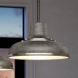 A beautiful pendant lamp enhances the urban ambiance in a room.