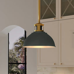 A beautiful kitchen with a luxury Urban Ambiance UEX2520 Cosmopolitian Pendant 8''H x 10''W lamp hanging over a window.