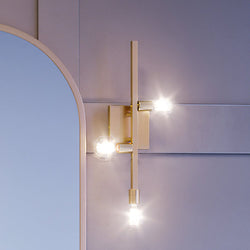 A beautiful UEX2532 Mid-Century Modern Wall Sconce with a light on it.