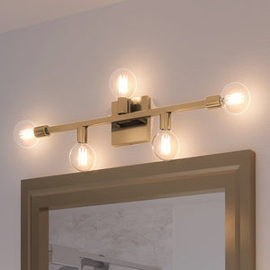 A bathroom with a gorgeous Urban Ambiance UEX2533 Mid-Century Modern Bath Light lighting fixture above a mirror.