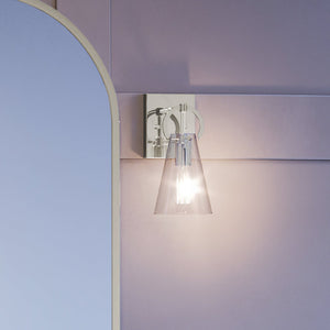 A beautiful UEX2540 New Traditional Wall Sconce 11''H x 4.75''W, Polished Nickel Finish, Irvine Collection with a glass shade and a mirror by Urban