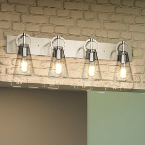 An Urban Ambiance bathroom vanity with a unique UEX2543 New Traditional Bath Light 10''H x 32''W, Polished Nickel Finish, Irvine Collection lamp and a brick wall.