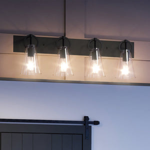 Three UEX2551 New Traditional Bath Lights hanging above a barn door, creating a beautiful lighting fixture.