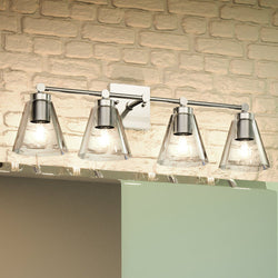 A bathroom with a unique Urban Ambiance UEX2568 New Traditional Bath Light 10''H x 33''W lamp fixture and a brick wall.