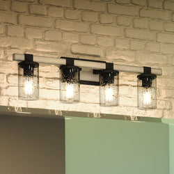 A gorgeous Urban Ambiance bathroom light fixture with four glass jars and a brick wall, the UEX2613 Industrial Bath Light 9''H x 29''W in Olde Iron