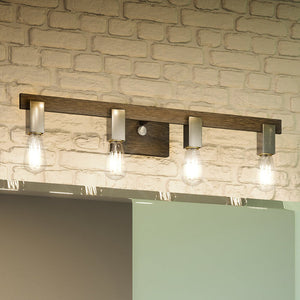 A unique bathroom with a UEX2633 Mid-Century Modern Bath Light 5''H x 30''W, Satin Nickel Finish lamp fixture and a brick wall.