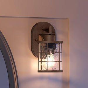 A luxurious lighting fixture, the UEX2650 Utilitarian Wall Sconce 11''H x 5''W from the Jeannette Collection by Urban Ambiance enhances any space with its