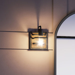 A gorgeous UEX2660 Utilitarian Wall Sconce 8''H x 6''W, Matte Black Finish, Ambridge Collection with a mirror on it by Urban Ambiance.