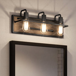 A luxury bathroom vanity with three UEX2662 Utilitarian Bath Light 8''H x 20''W lamps and a mirror.