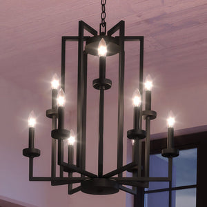 A gorgeous black UEX2682 Tudor Chandelier lighting fixture hanging in a room.