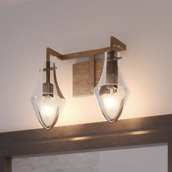 A beautiful bathroom with a unique mirror and two Urban Ambiance UEX2732 Scandinavian Bath Light fixtures.