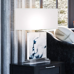 A unique and luxury lighting fixture, the UEX7240 Coastal Table Lamp from the Leavenworth Collection by Urban Ambiance brings a touch of elegance to any living room with its Blue and
