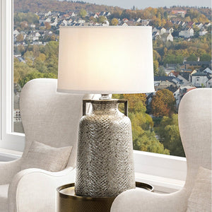A unique lighting fixture, the UEX7310 Mediterranean Table Lamp from the Dorset Collection by Urban Ambiance adds a beautiful touch to any space when placed on a table in front of a window.