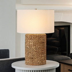 A unique lighting fixture, the UEX7320 Scandinavian Table Lamp from the Eureka Collection by Urban Ambiance, adds a touch of luxury to any space with its natural brown finish, placed on a