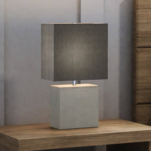 A unique UEX7350 Mid-Century-Modern Table Lamp 7.5''W x 7.5''D x 15''H, with a luxury polished concrete