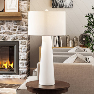 A living room with a gorgeous UEX7380 Modern Table Lamp 18''W x 18''D x 36''H, White Finish, Keene Collection lamp from Urban Ambiance.