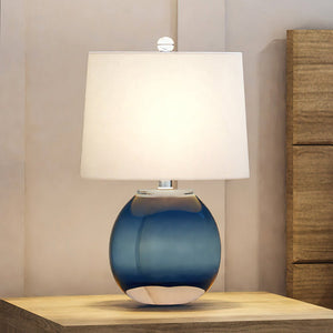 An UEX7630 Coastal Table Lamp 12''W x 8''D x 19''H, Clear Blue Finish by McCall Collection, from the brand Urban Ambiance, on top